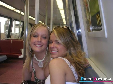Teenagers in the train for the camera.
