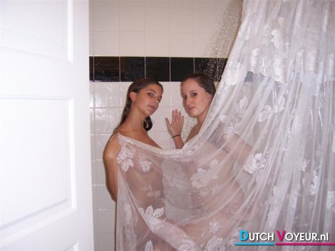 Teens behind the shower curtain
