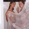 Teens behind the shower curtain