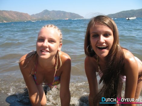 Teens on their knees in water