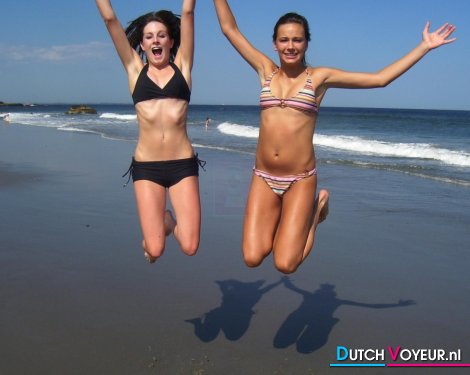 Girls jumping into the sea