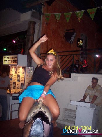 girl is behind a string tanga!