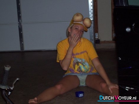 poses with a hot piece of discrete G-string